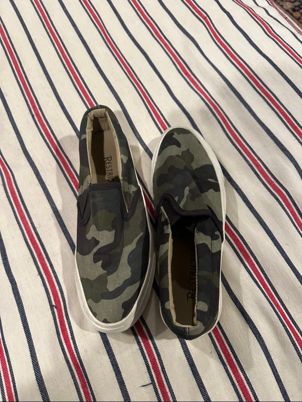 Restricted women’s Olive Camo Slip-On Sneakers